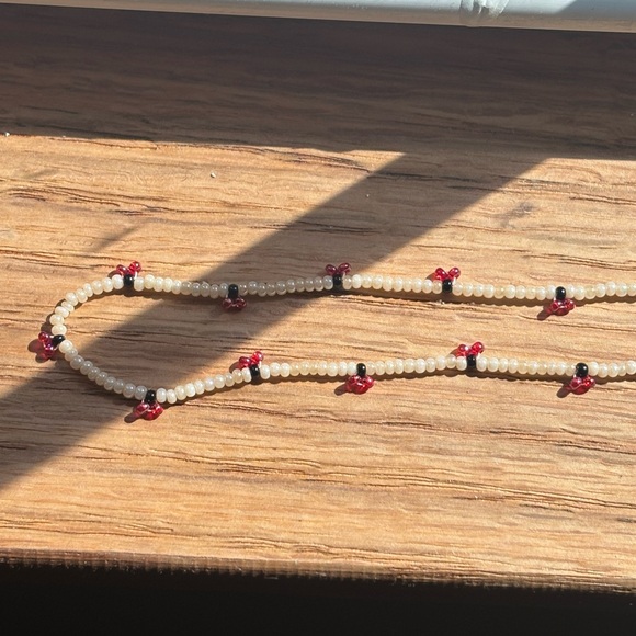 Handmade Delicate Cream Beaded Necklace with Red Accent Beads - Picture 3 of 5